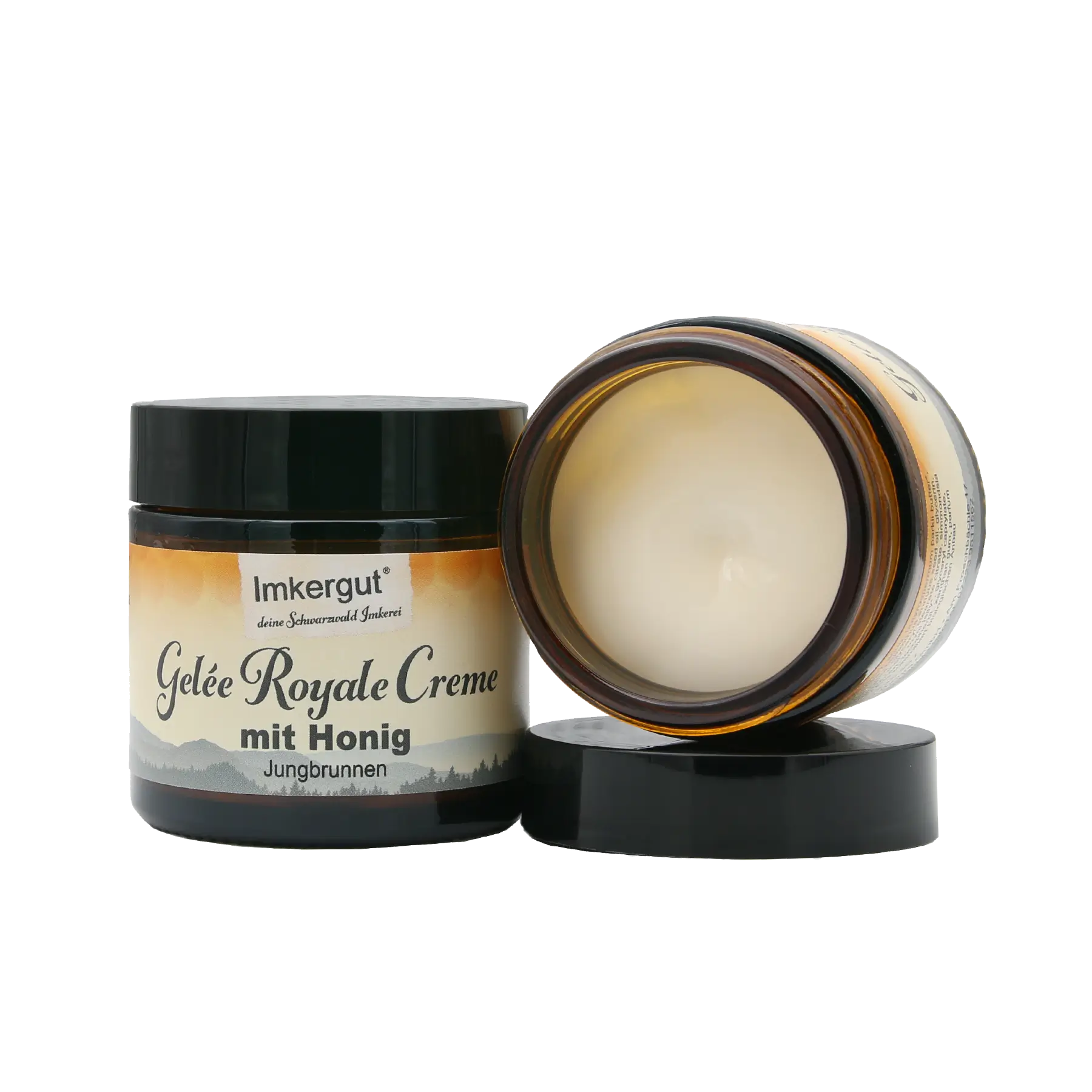 Gelee Royale Creme geöffnet liegend neben geschlossener Gelee Royale Creme mit neuem Etikett