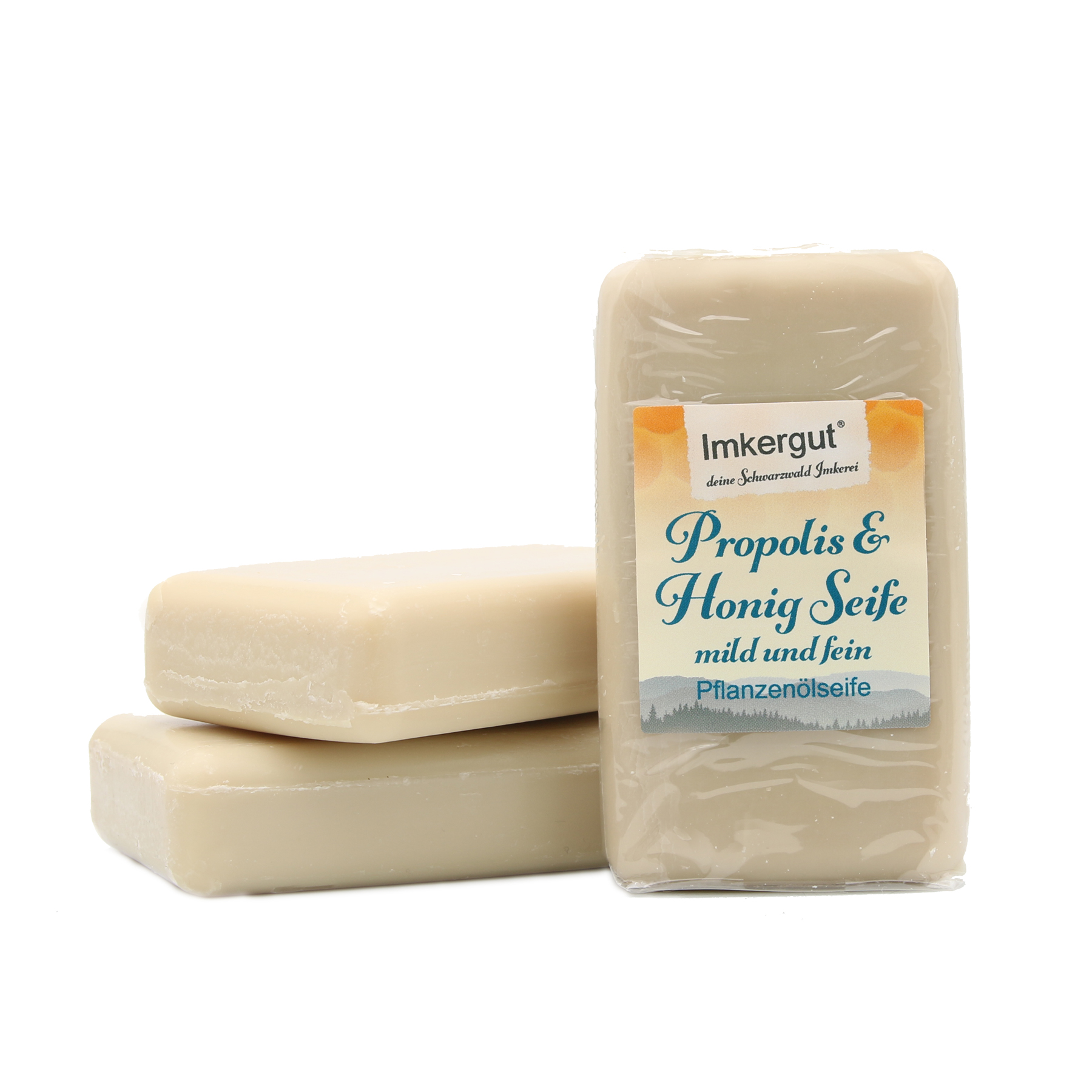 Propolis Honig Seife verpackt mit neuem Etikett vor unverpackter Propolis Honig Seife